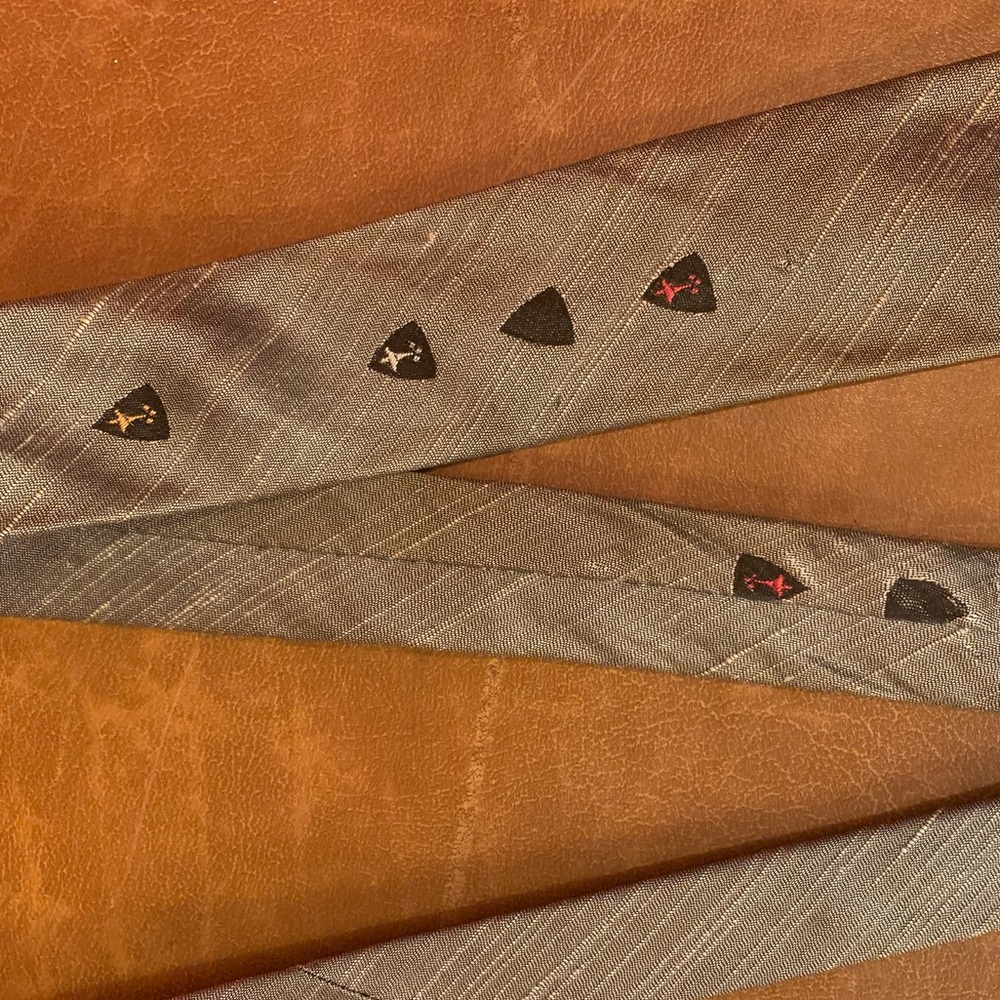 Vintage 1950’s silver skinny tie with starbursts
